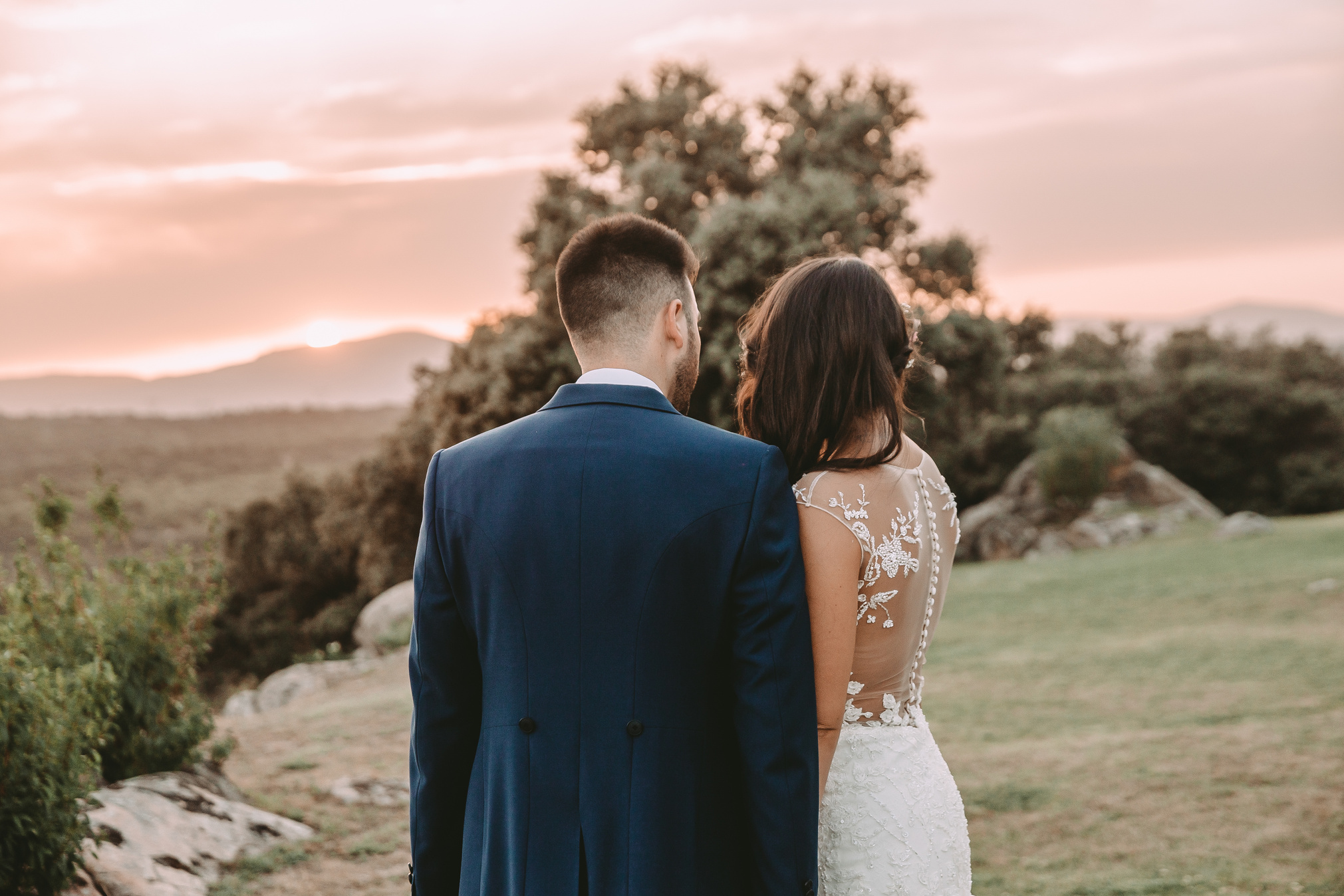 Newlywed Couple Posing Outdoors